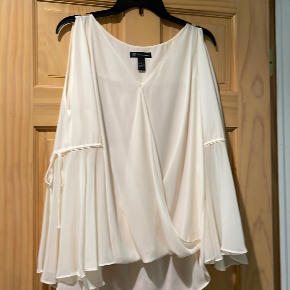 Womens cold shoulder blouse. Creamy white